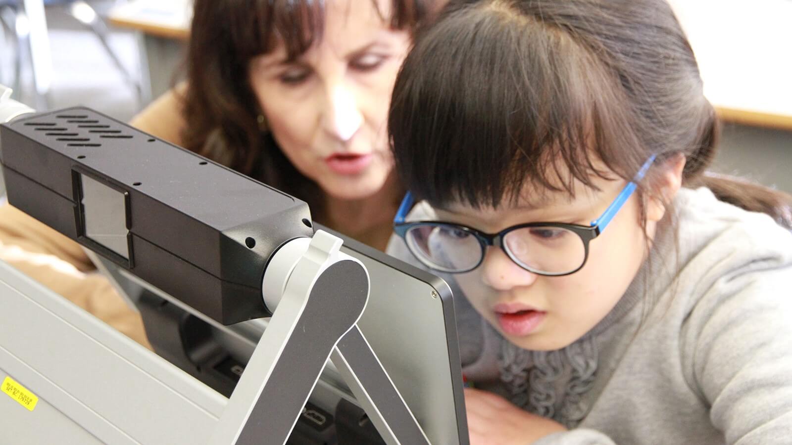 Student with vision device