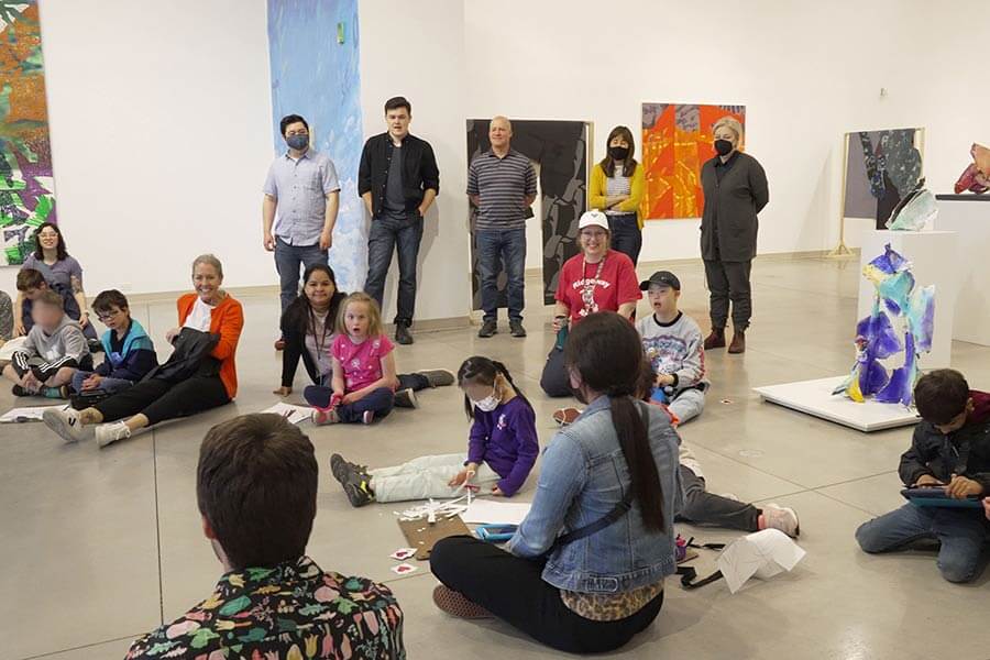 Students of diverse learning attending an Art Inclusion camp at an art gallery